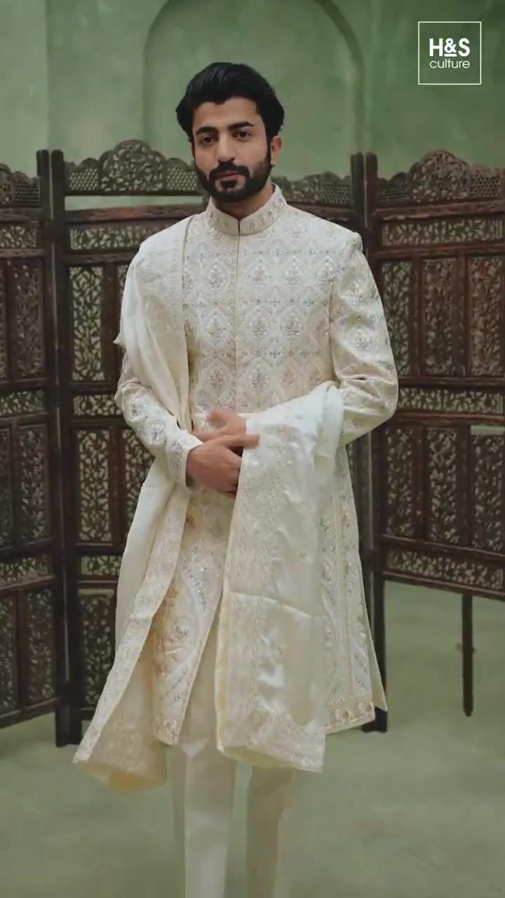 Ivory embroidered sherwani from The House of Vastra